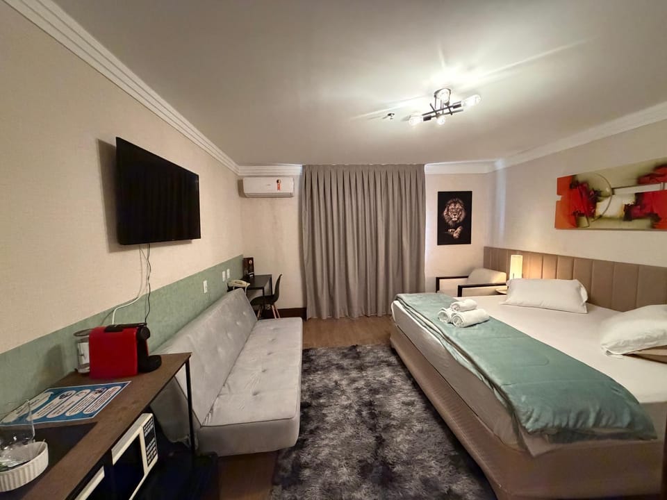 Communal lounge/ TV room, Bed, TV and multimedia, Photo of the whole room, Seating area, Bedroom, air conditioner