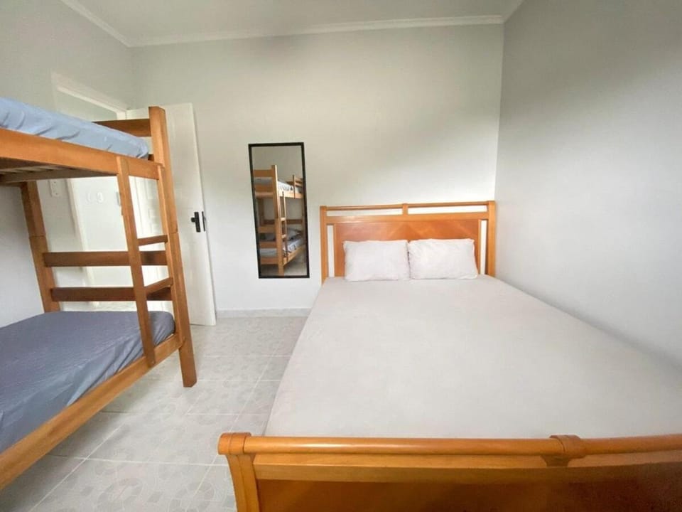 Apartamento encantador próximo da Praia da Enseada Apartment in State of São Paulo
