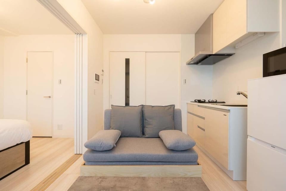 Bed, Kitchen or kitchenette, Living room, Seating area, stove