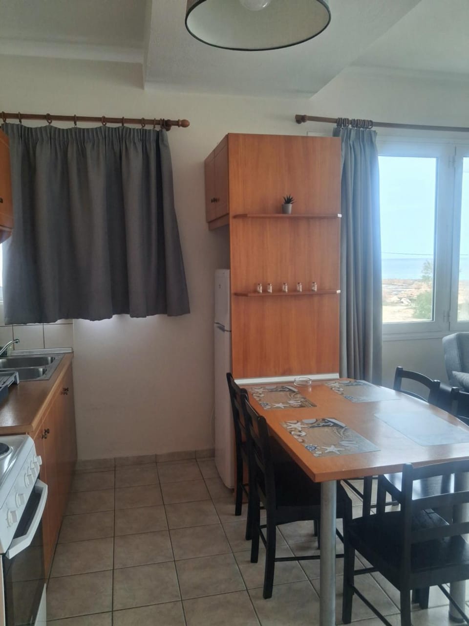 Kitchen or kitchenette, Dining area, Sea view, Sea view, Sunset