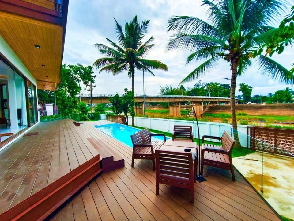 Property building, Patio, Day, Natural landscape, Garden, Garden view, Pool view, Swimming pool, sunbed