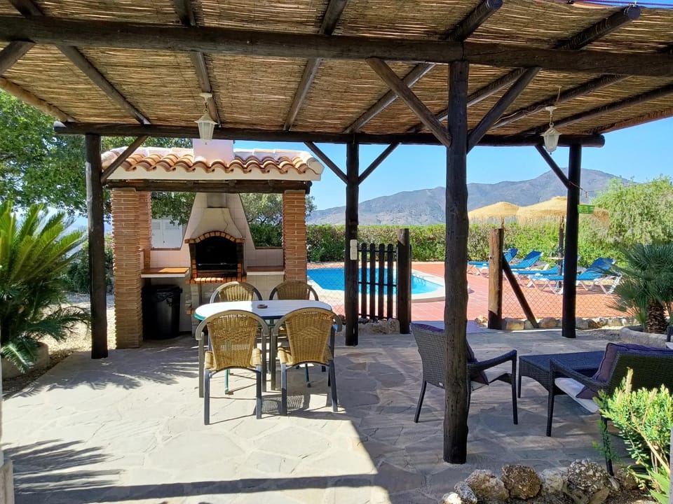 Patio, BBQ facilities, Pool view, Swimming pool