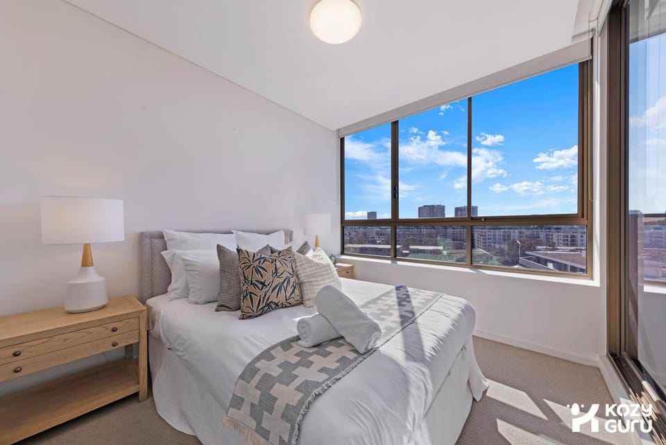 KozyGuru | Wentworth Point | 2B APT+Free Parking Apartment in Sydney