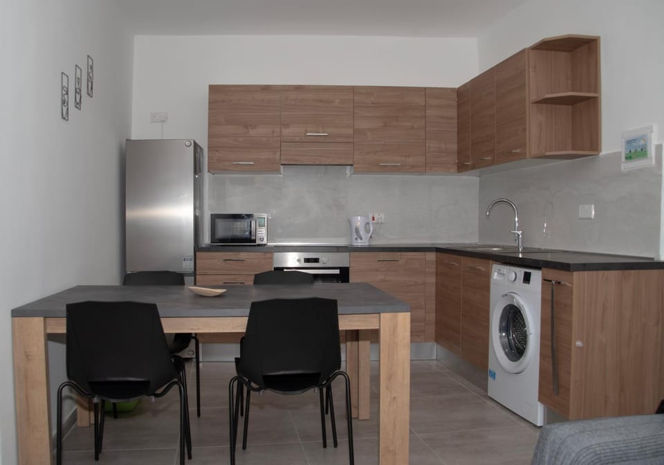 Kitchen or kitchenette, Living room, Dining area, oven, stove, washing machine