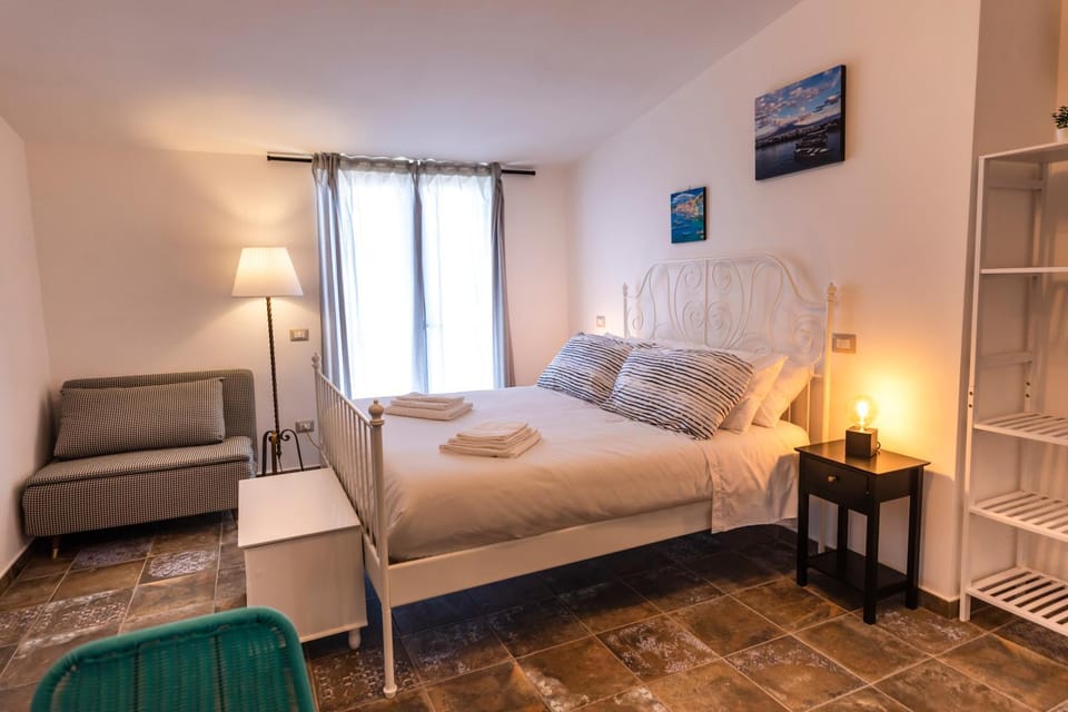 Bed, Decorative detail, Seating area, Mountain view, Sea view, bidet, towels, air conditioner