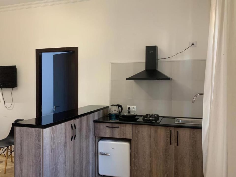 Kitchen or kitchenette, stove