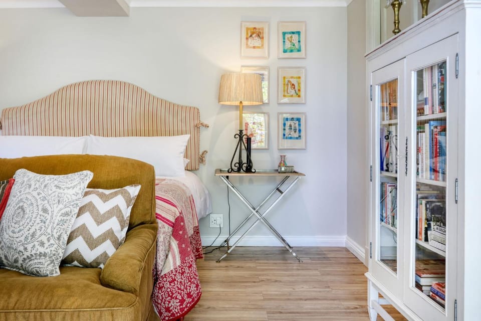 Bed, Library, Seating area, Bedroom