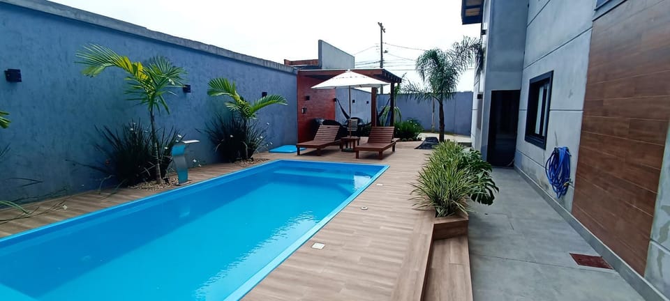 Property building, Patio, Day, Garden, Garden view, Pool view, Swimming pool, sunbed