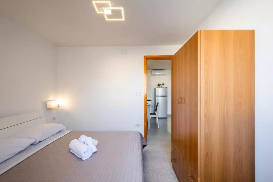 Bed, Photo of the whole room, Bedroom, towels, wardrobe
