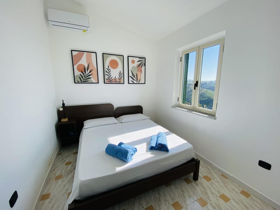 Bed, Photo of the whole room, Bedroom, towels, air conditioner