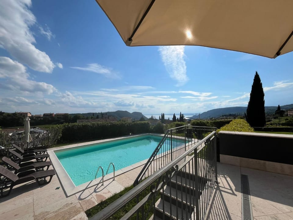 Nearby landmark, Natural landscape, View (from property/room), Pool view, Swimming pool, sunbed