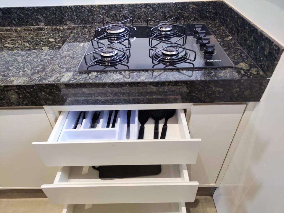 Kitchen or kitchenette, stove