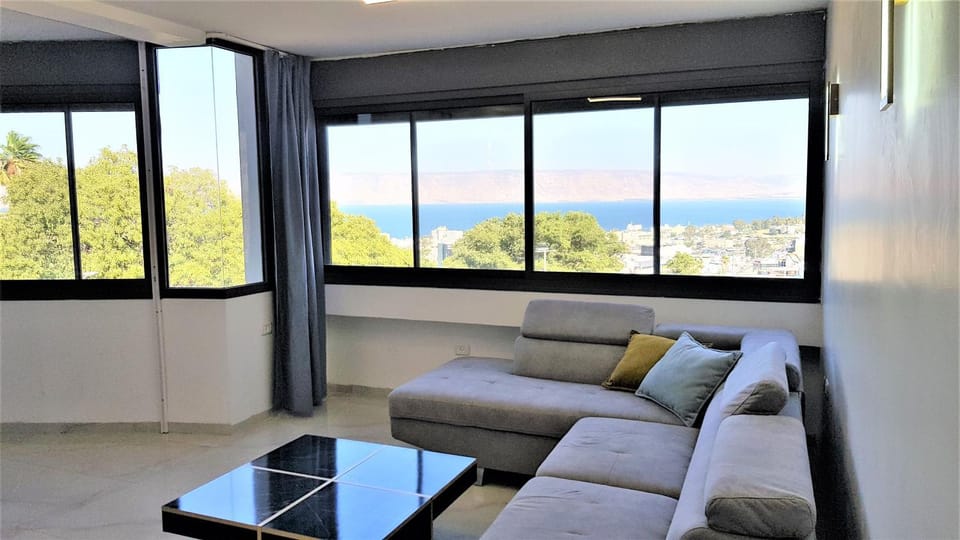 Natural landscape, Living room, Seating area, Sea view