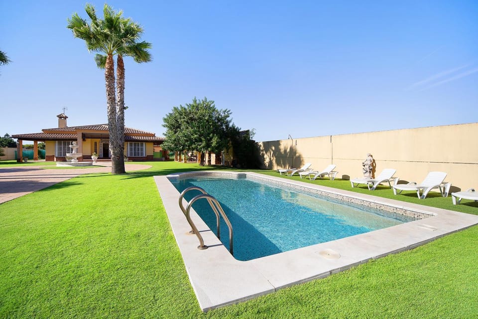 Property building, Living room, Swimming pool