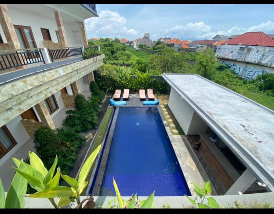 Property building, Day, Pool view, Swimming pool, sunbed
