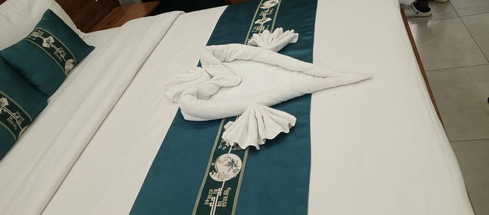 Bed, Photo of the whole room, Bedroom, towels