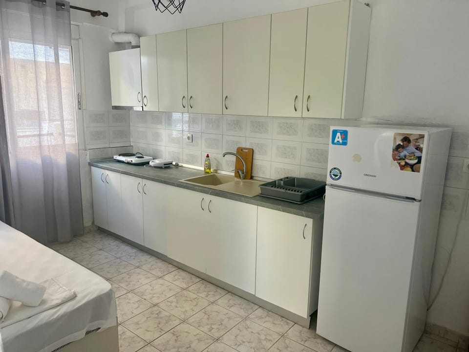 Kitchen or kitchenette, stove