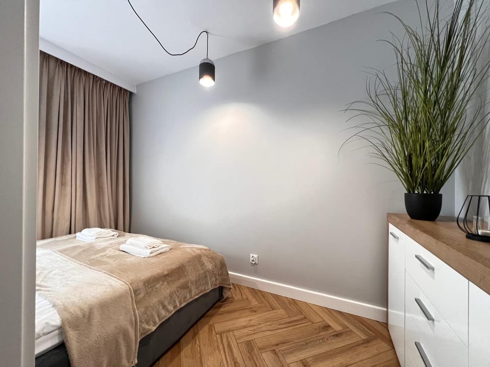 Bed, Photo of the whole room, Decorative detail, Bedroom, towels, air conditioner