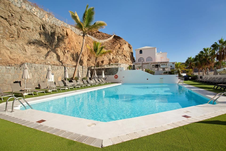 Property building, Living room, Swimming pool