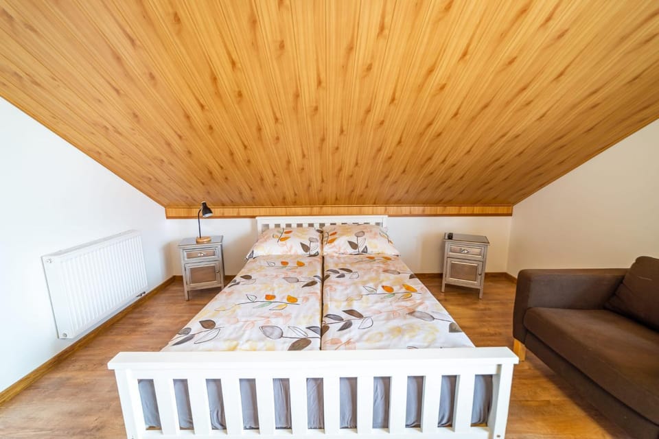 Bed, Living room, Seating area, Bedroom