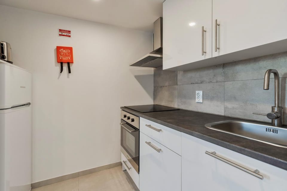 Kitchen or kitchenette, oven, stove