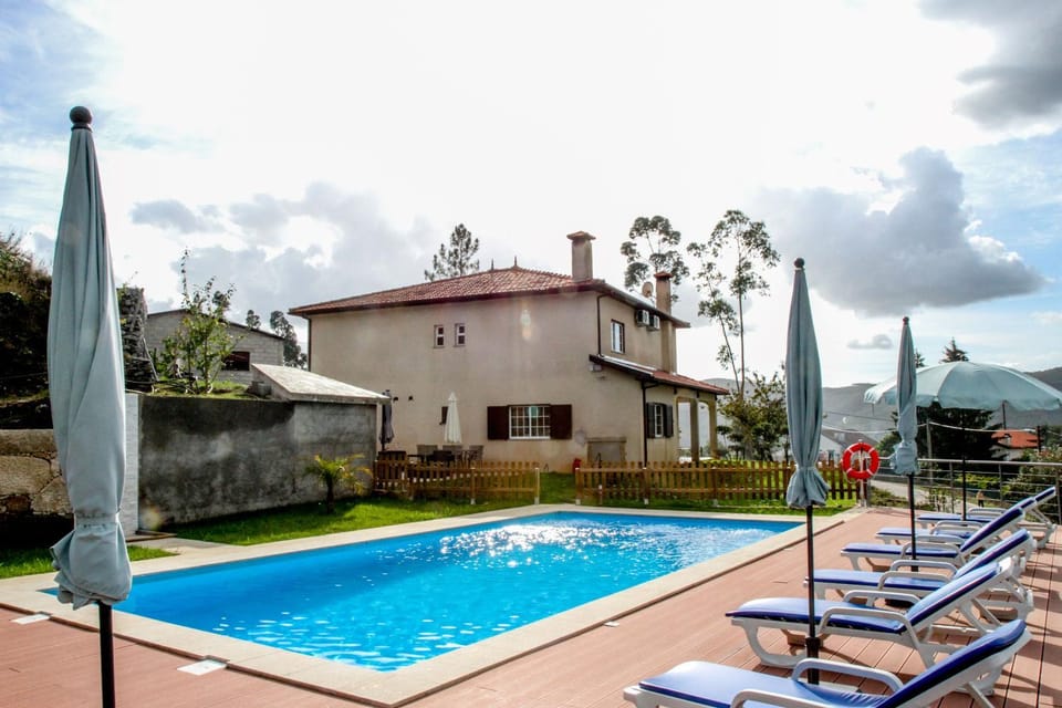 Property building, Patio, Day, Natural landscape, Garden, Garden view, Pool view, Swimming pool, sunbed