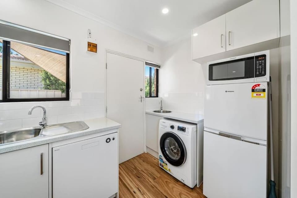 Kitchen or kitchenette, washing machine