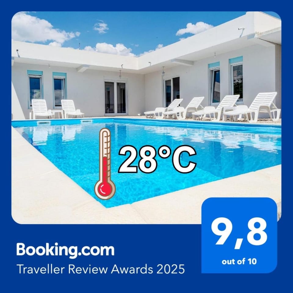 Property building, Logo/Certificate/Sign, Pool view, Swimming pool, Certificate/Award, sunbed