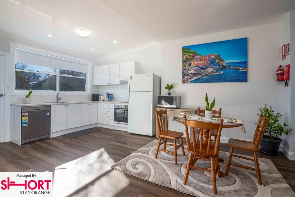 Dining area, dishwasher, oven, stove, kitchen