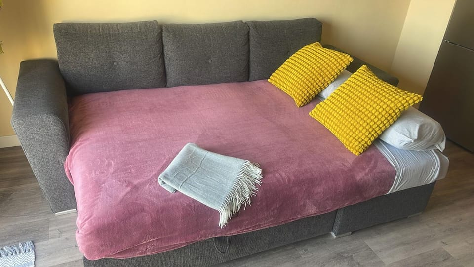 Bed, Living room, Seating area