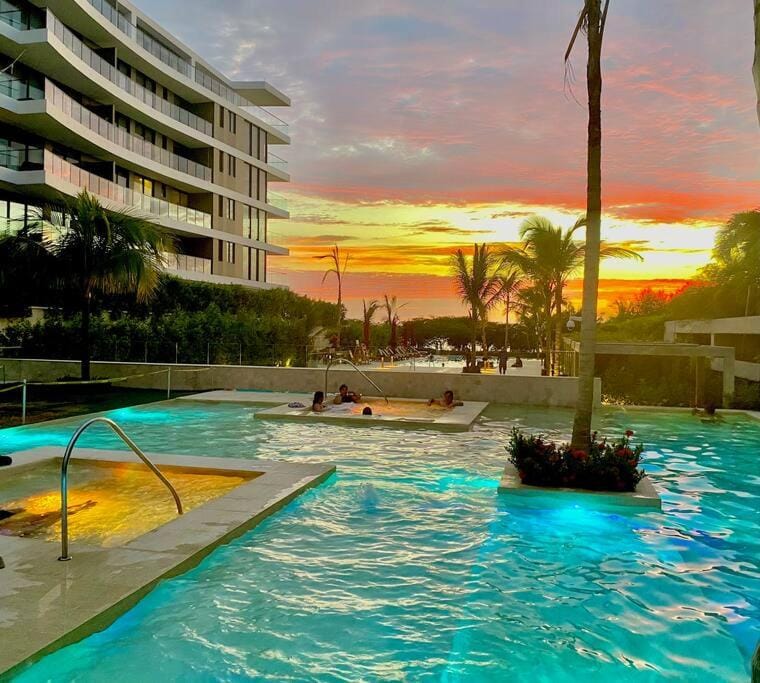 Property building, Natural landscape, Pool view, Swimming pool, Swimming pool, Sunset, sunbed
