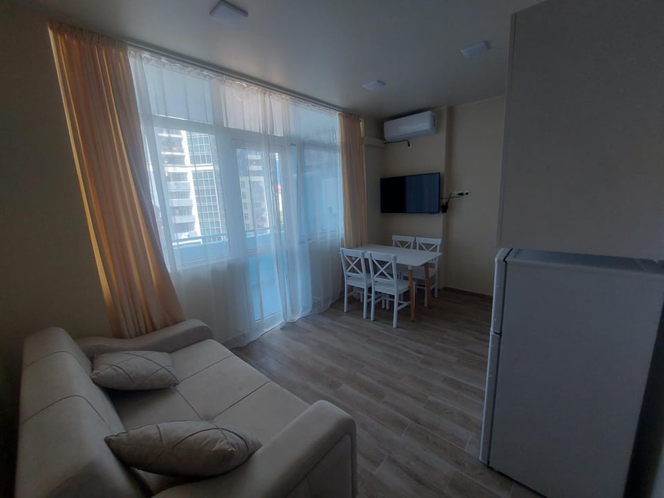 TV and multimedia, Kitchen or kitchenette, Living room, Seating area, Dining area, air conditioner