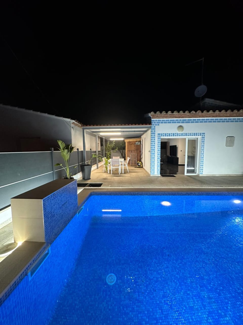 Property building, Patio, Night, Pool view, Swimming pool