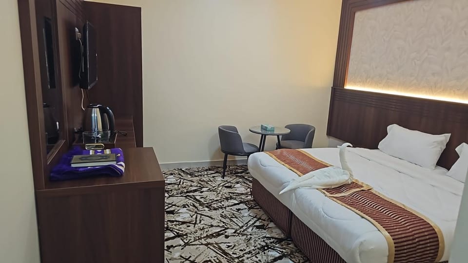 Bed, TV and multimedia, hair dresser, towels