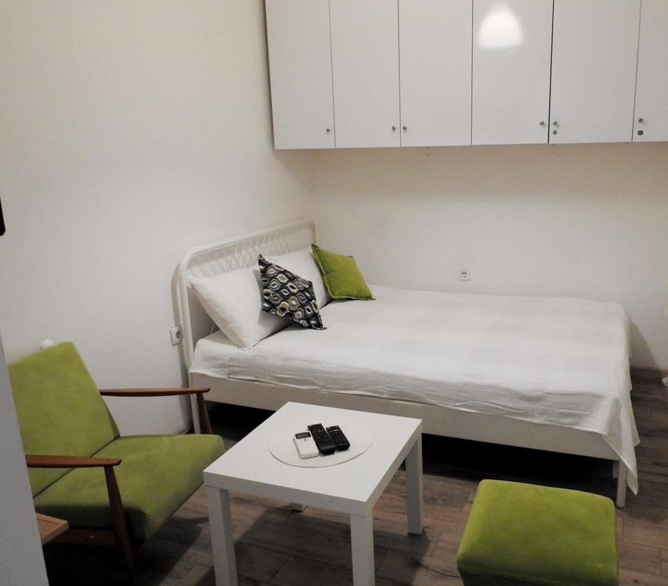 Bed, Living room, Seating area, wardrobe