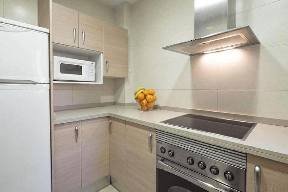 Kitchen or kitchenette, stove, toaster