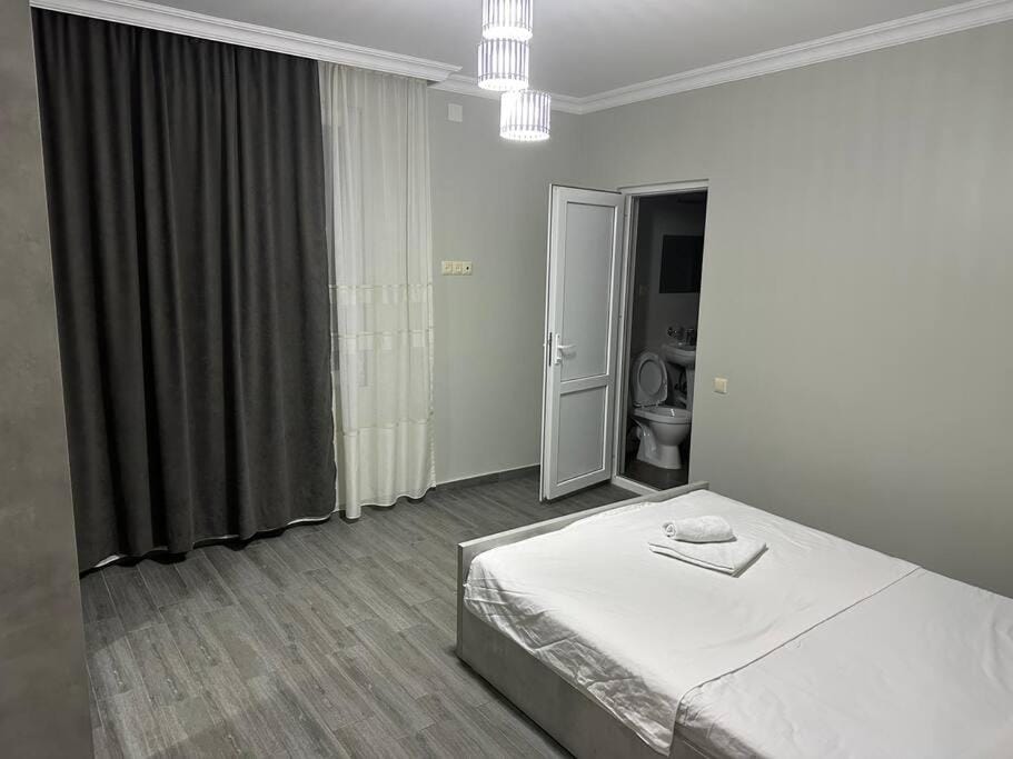 Bed, Photo of the whole room, Bedroom, towels, wardrobe
