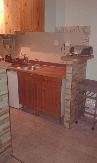 Kitchen or kitchenette, stove