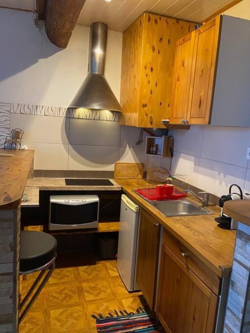 Kitchen or kitchenette, stove