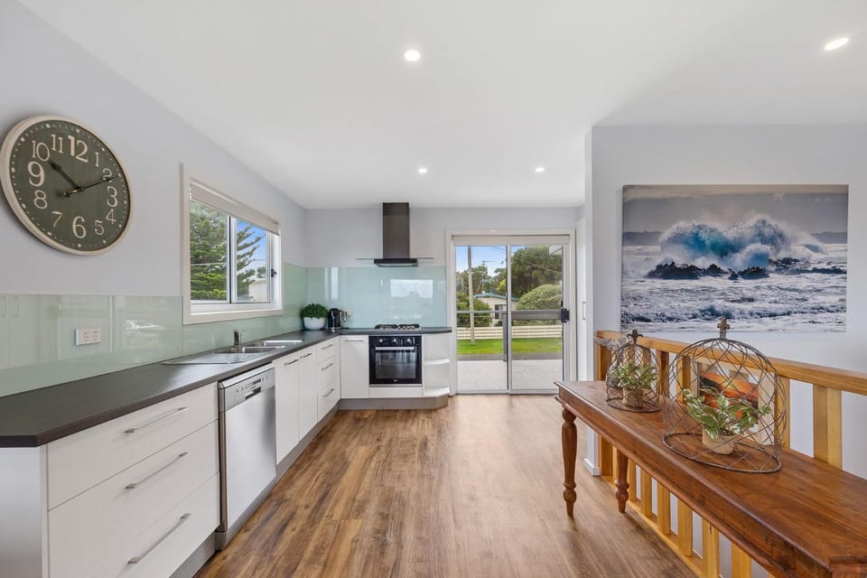 Kitchen or kitchenette, dishwasher, oven, stove