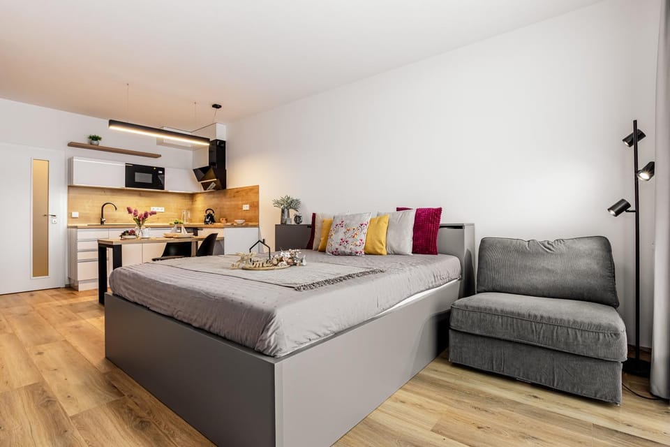Bed, Kitchen or kitchenette, Seating area