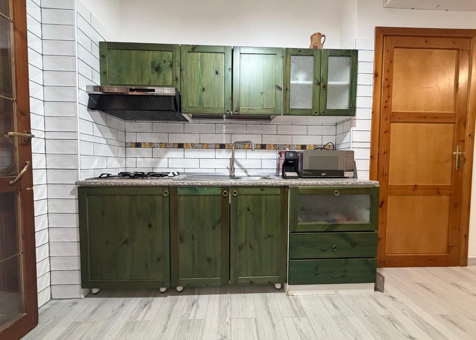 Kitchen or kitchenette, stove