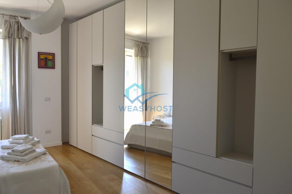 Bed, Photo of the whole room, Bedroom, towels, wardrobe