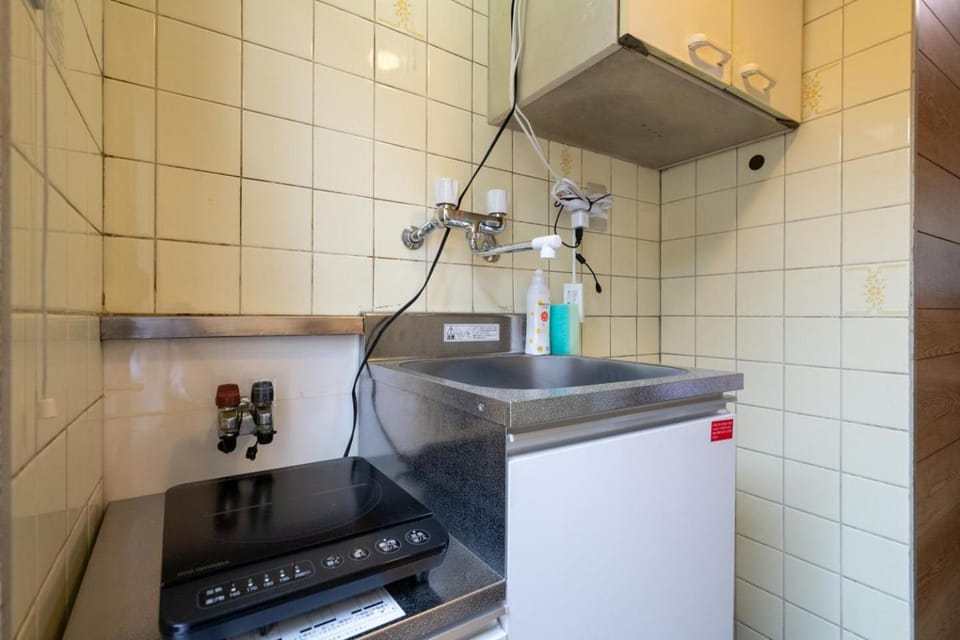 Kitchen or kitchenette, stove
