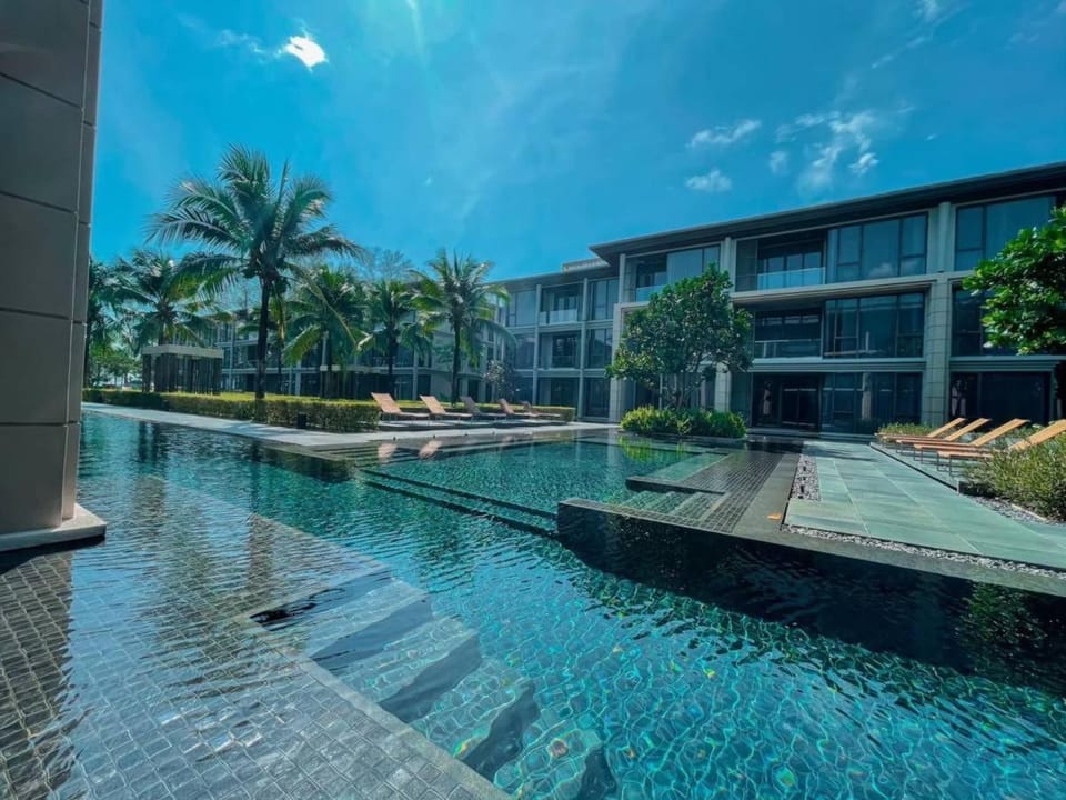 Property building, Pool view, Swimming pool, sunbed