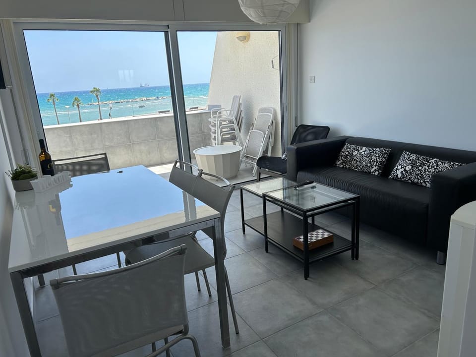 Patio, Natural landscape, View (from property/room), Balcony/Terrace, Living room, Seating area, Dining area, Beach, Sea view