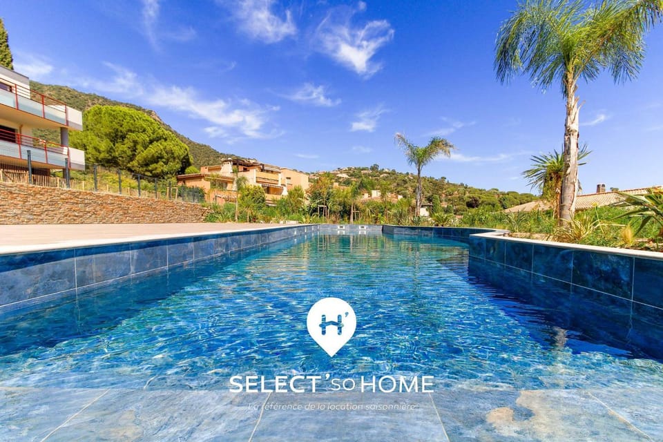 Property building, Nearby landmark, Day, Property logo or sign, Natural landscape, Pool view, Swimming pool