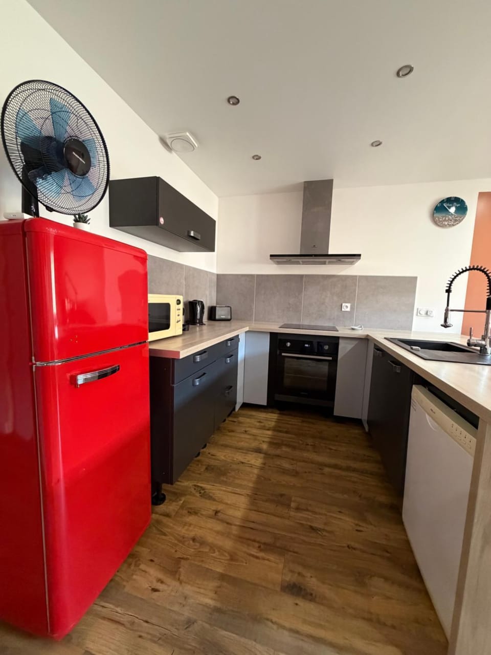Kitchen or kitchenette, dishwasher, oven, stove, toaster
