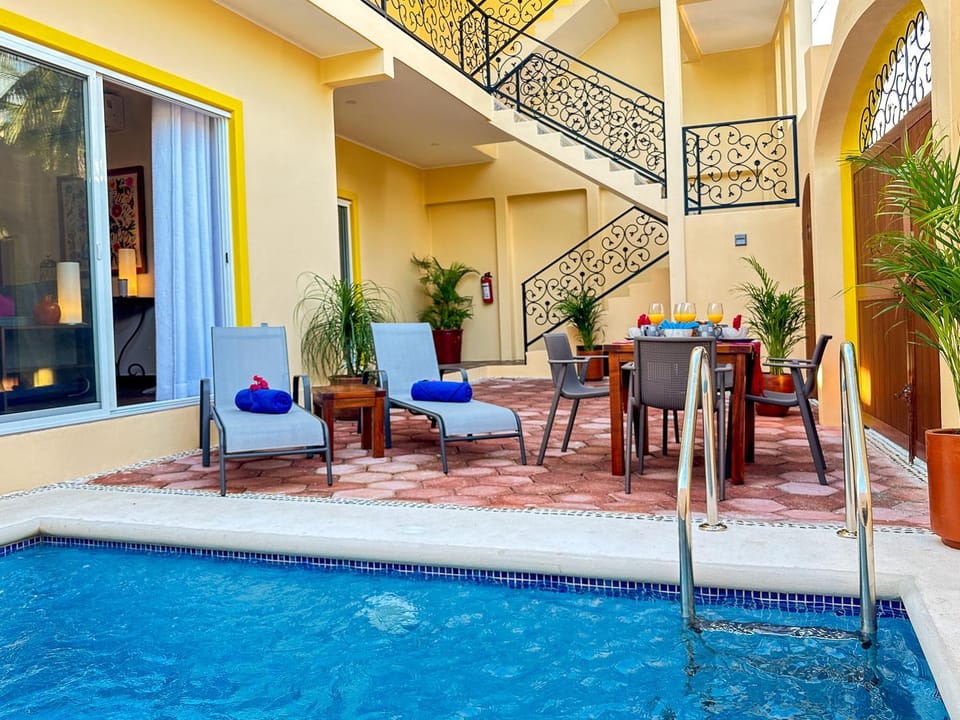 Property building, Pool view, Swimming pool, sunbed