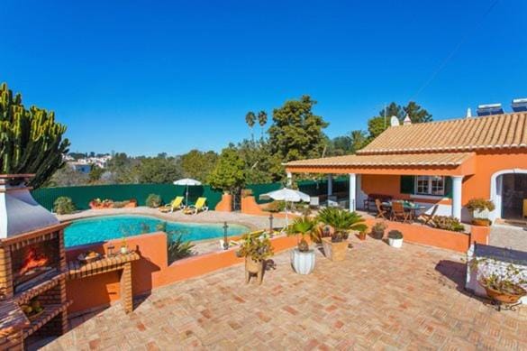 Patio, Day, Pool view, Swimming pool, sunbed